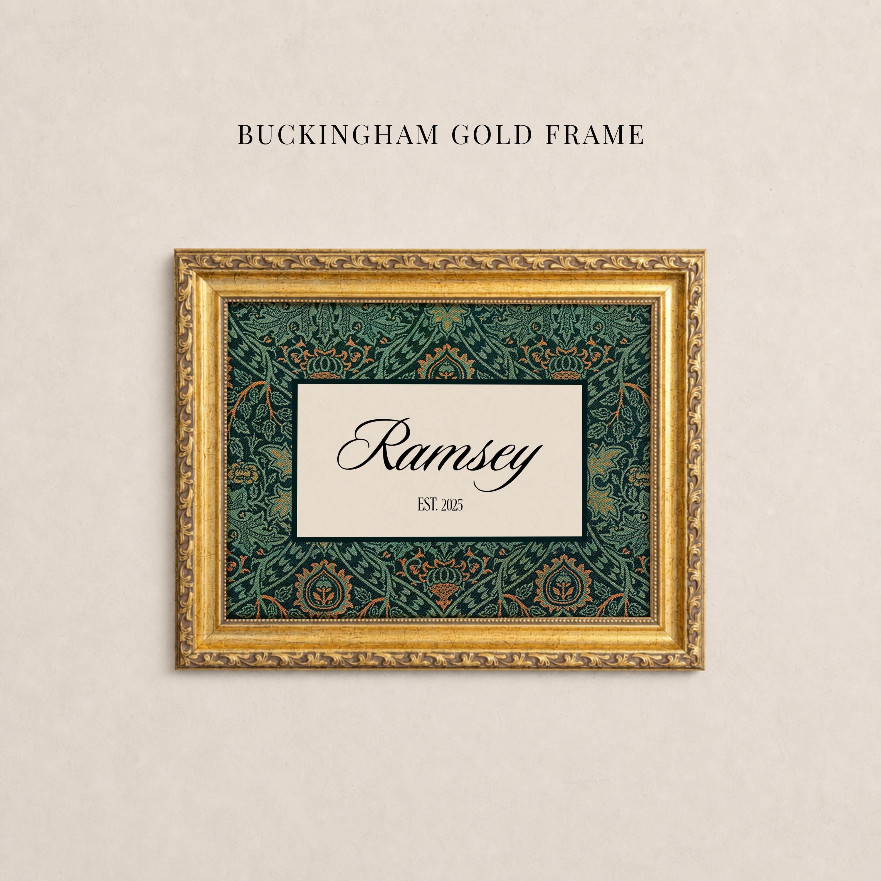May include: A rectangular gold frame with ornate detailing surrounding a central cream-colored rectangular insert. The insert features a dark green and orange floral pattern border with the text Ramsey and EST. 2025 in black script and serif font.
