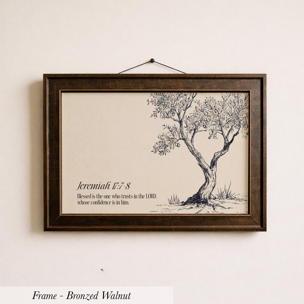 A framed print of a tree with a Bible verse from Jeremiah 17:8 displayed on the wall.