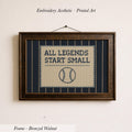 a framed embroidered design with the text "ALL LEGENDS START SMALL" and a baseball graphic.