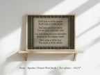 a framed sign with a list of lyrics, including advice for a man, such as holding him a little longer, rocking him a little more, and telling him another story.