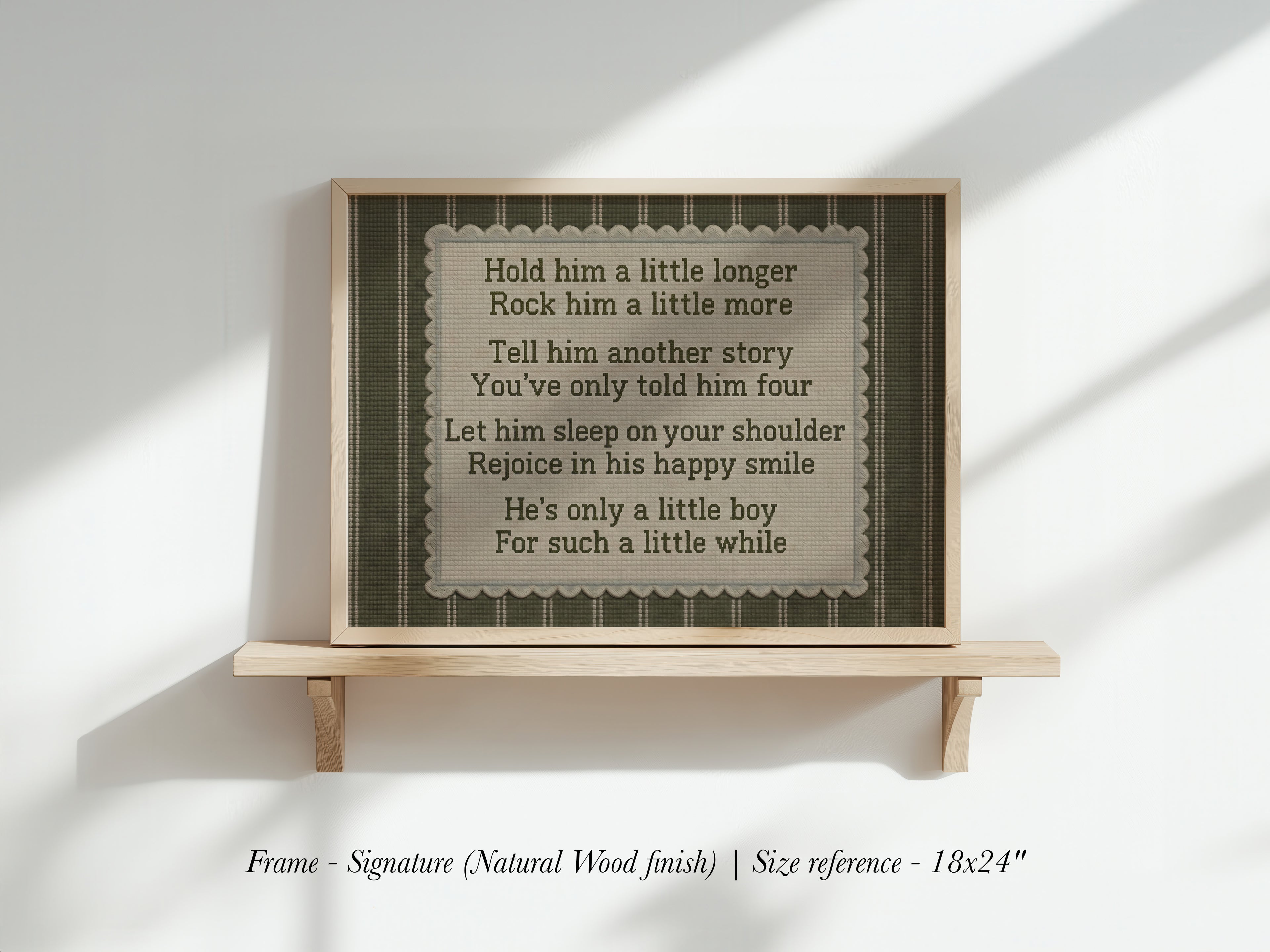 a framed sign with a list of lyrics, including advice for a man, such as holding him a little longer, rocking him a little more, and telling him another story.