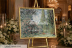 a large framed sign displaying the name "The Smiths" and the date "September 12th, 2016" in a formal setting with floral arrangements and candles.
