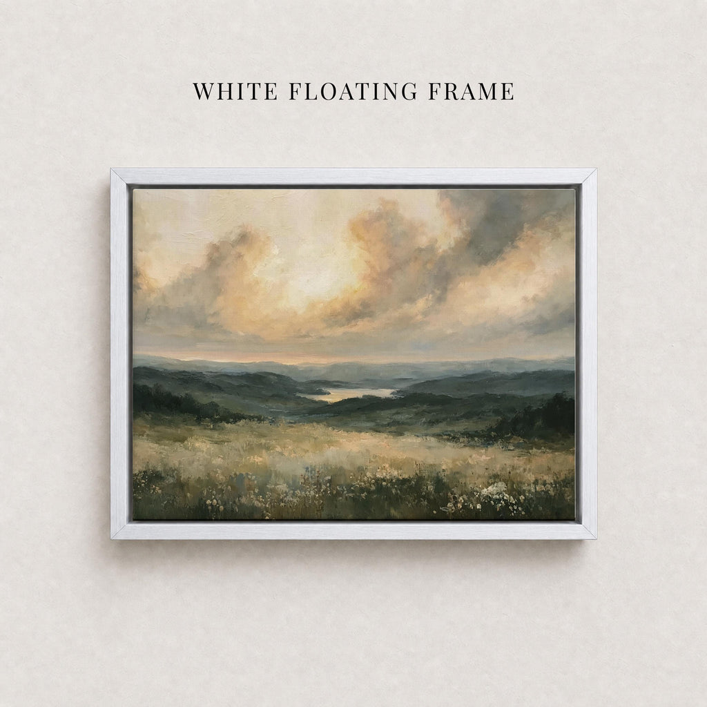 The image is a framed landscape painting depicting a serene countryside scene with rolling hills, a lake, and a cloudy sky.