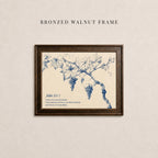 The image is a framed print of a blue and white illustration depicting a vine with grapes on a branch.