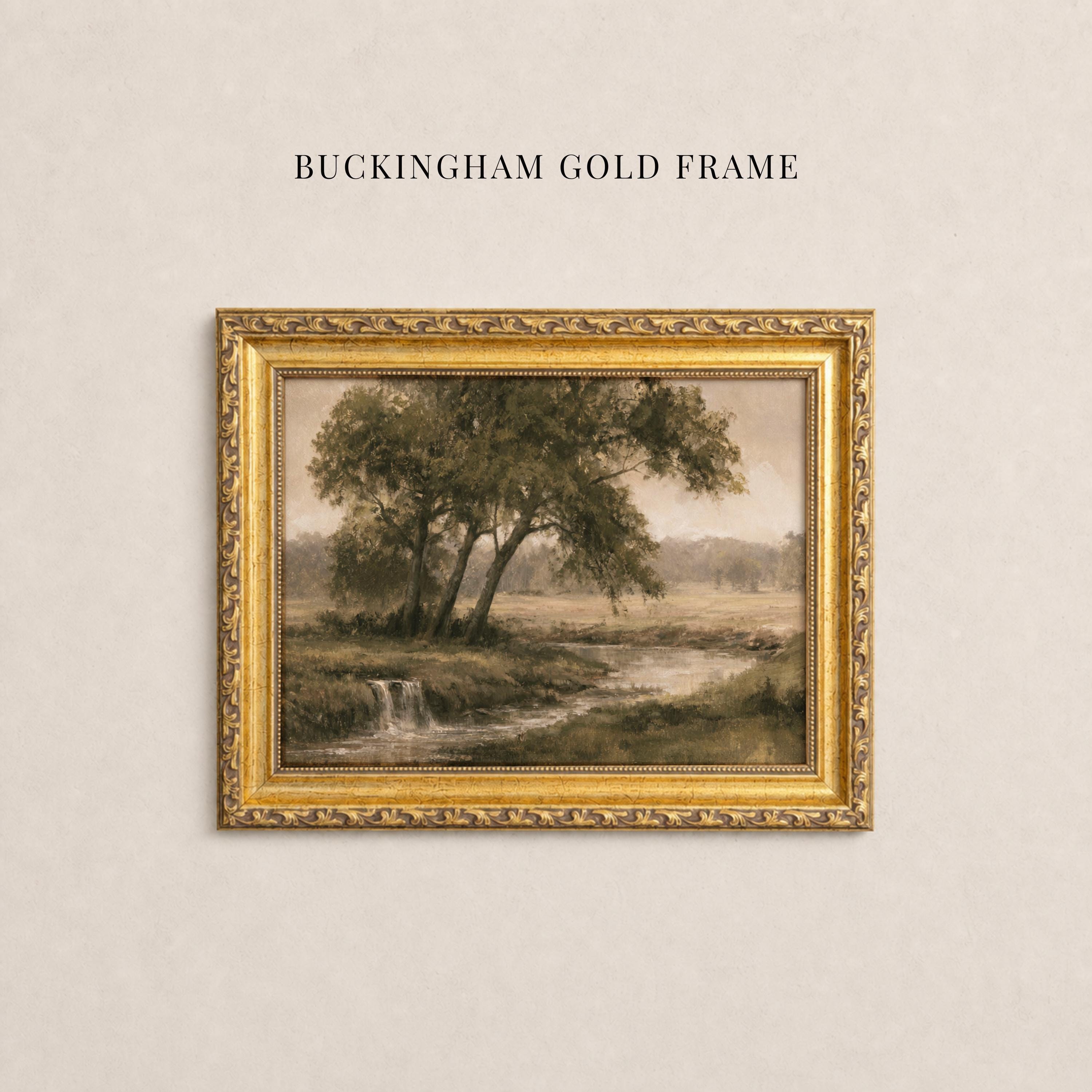A painting of a tree with a waterfall in the background, displayed in a gold-framed frame against a beige wall.