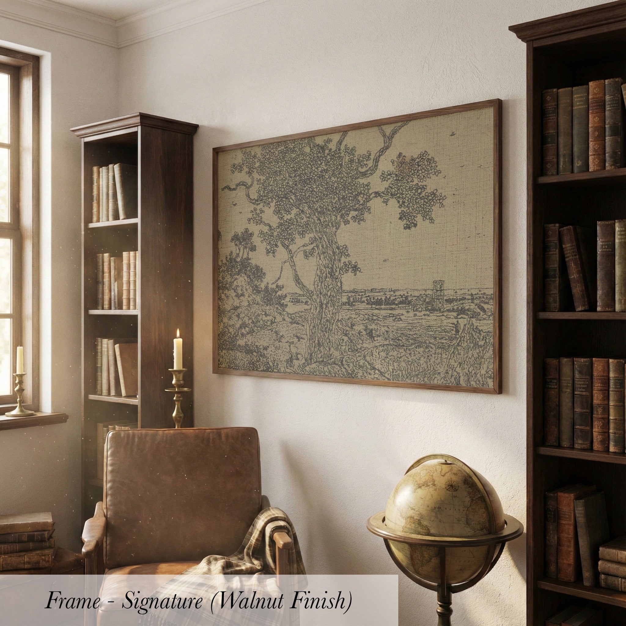 a cozy living room with a large framed artwork depicting a tree on the wall, a leather armchair, a globe, and a bookshelf filled with books.