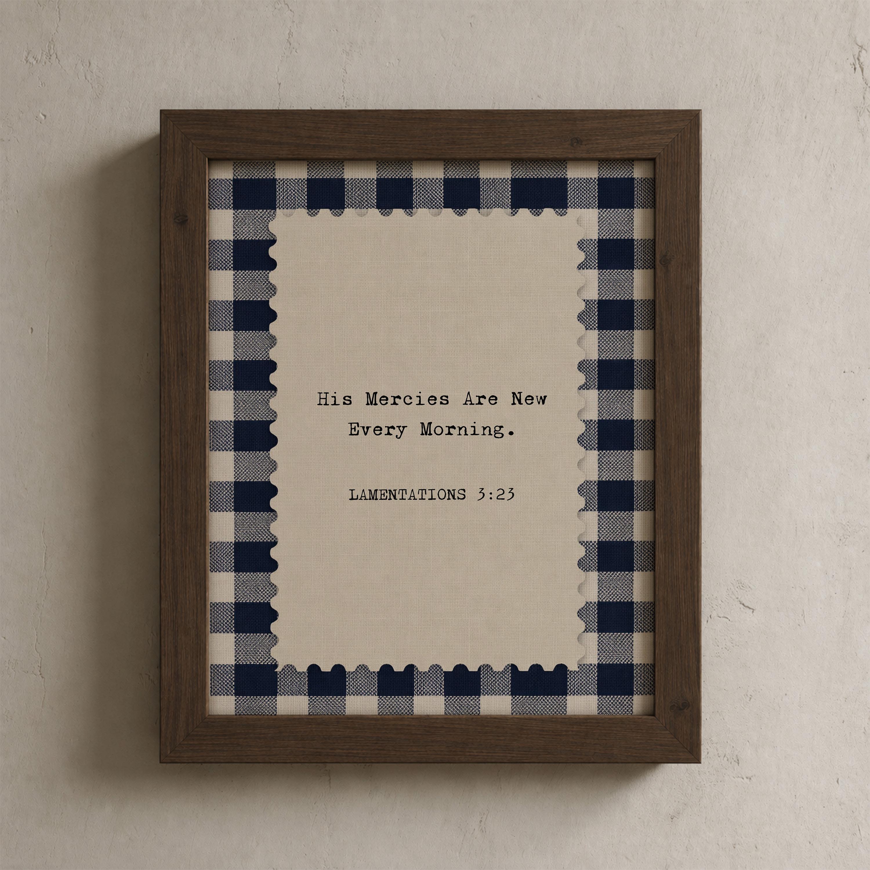 a framed print with a blue and white checkered border and a message about God's mercies.