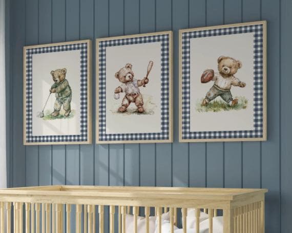three framed pictures of teddy bears, each depicting a different activity - one holding a baseball bat, one holding a football, and one holding a golf club.