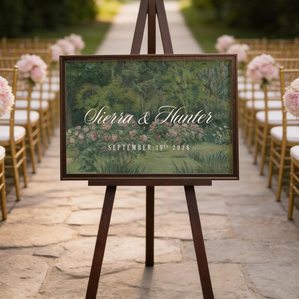 a wedding ceremony setup with a wooden sign displaying the names 'Sierra & Hunter' and the date 'SEPTEMBER 19, 2026'. The sign is placed in front of rows of chairs, and there are pink flowers decorating the chairs. The setting appears to be a garden or outdoor venue, with string lights visible in the background.