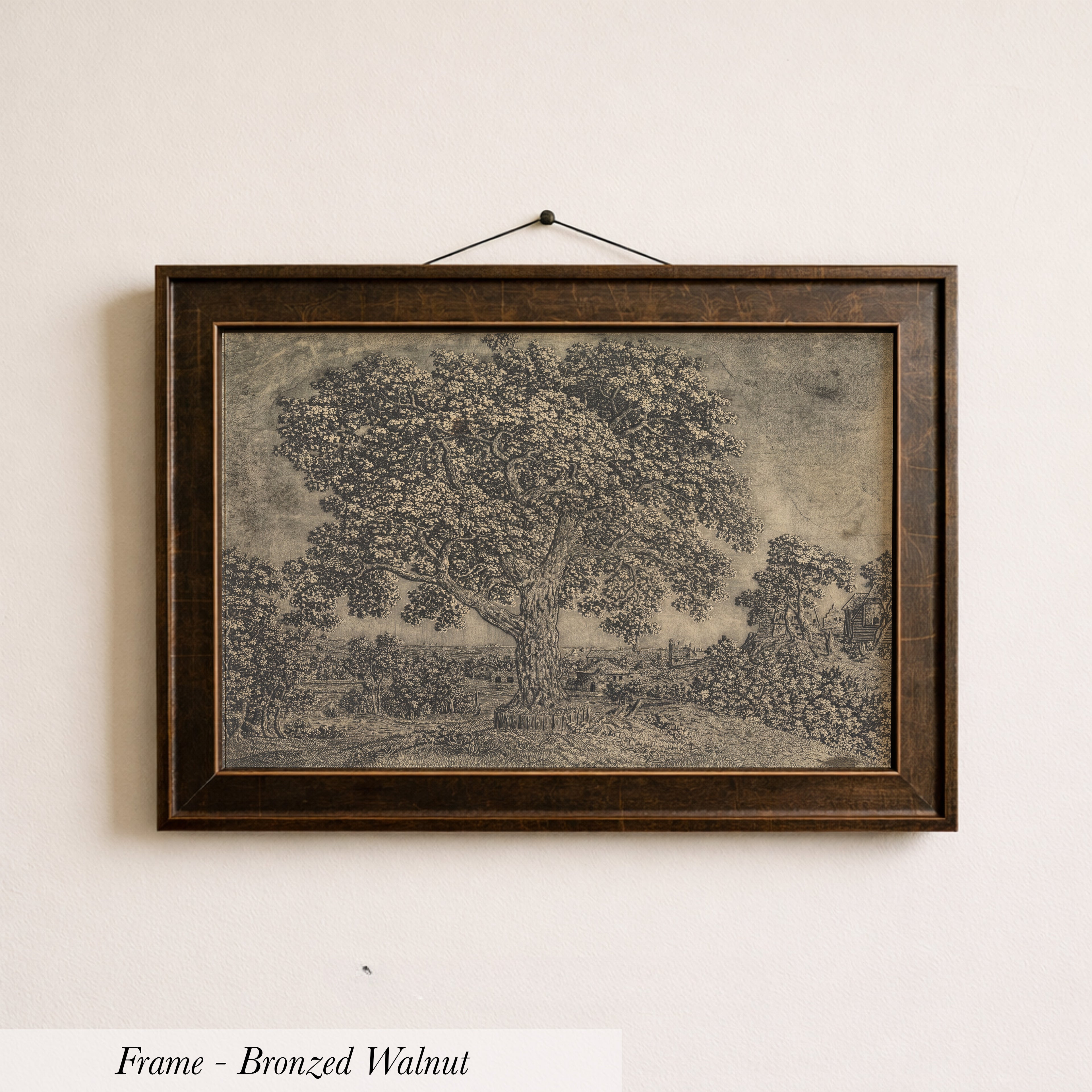 The image is a framed bronze-colored painting of a walnut tree.