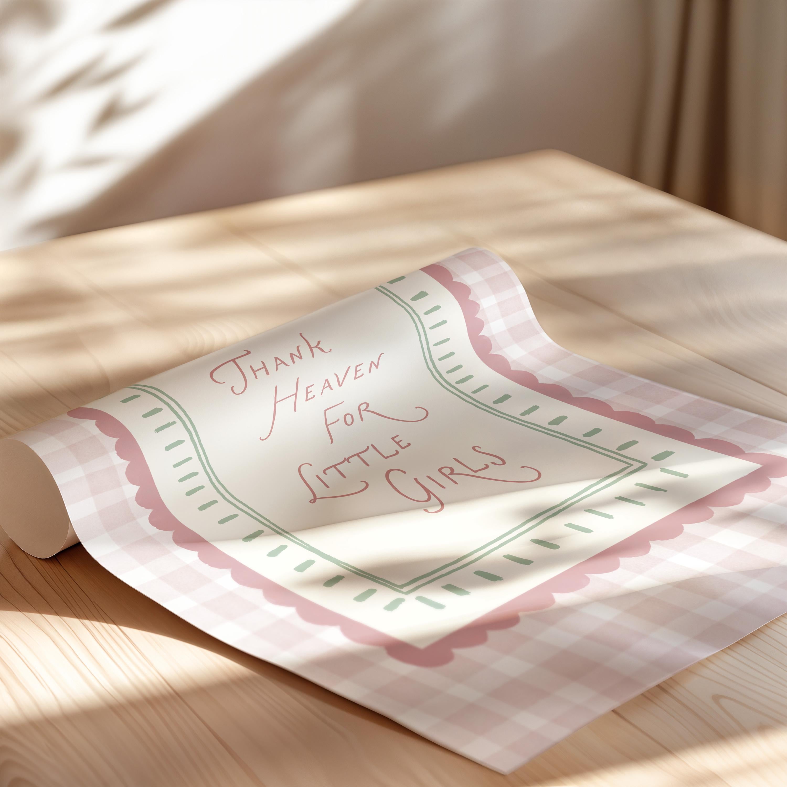 a rolled-up paper with a message written on it, placed on a wooden surface.