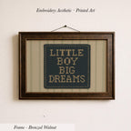 a framed embroidered piece of art with the text "LITTLE BOY BIG DREAMS" on it.