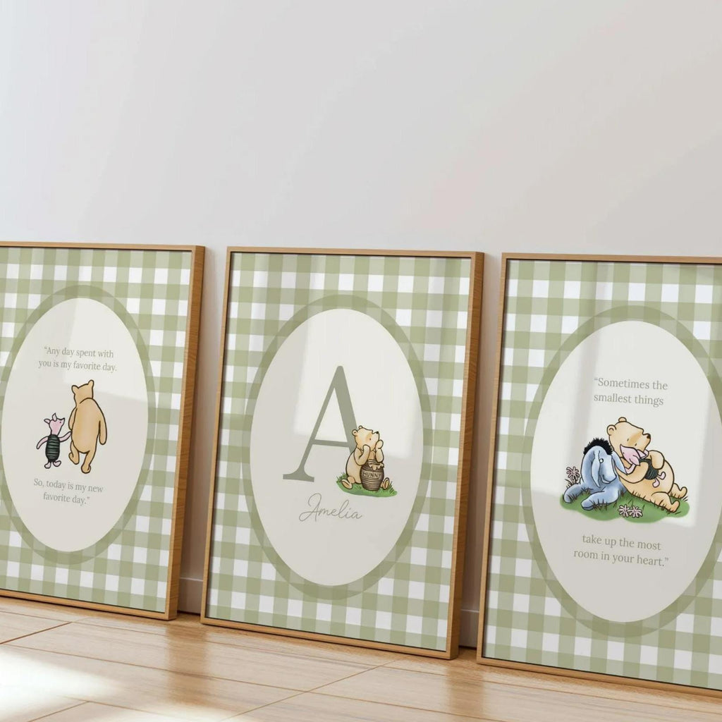 three framed prints featuring illustrations of characters from the Winnie the Pooh series, including Piglet, A, and Eeyore.