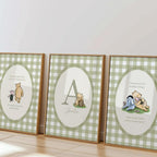 three framed prints featuring illustrations of characters from the Winnie the Pooh series, including Piglet, A, and Eeyore.