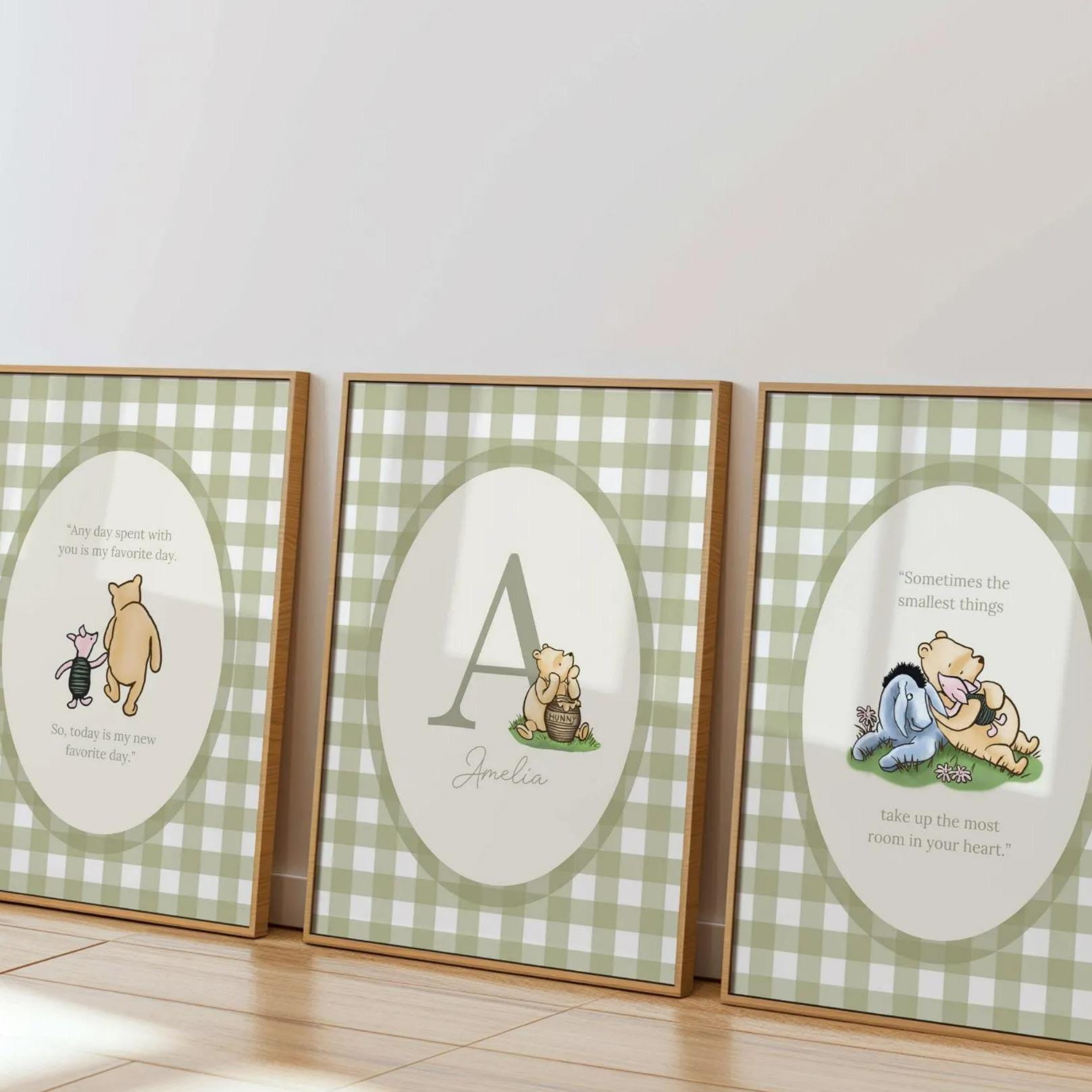 three framed prints featuring illustrations of characters from the Winnie the Pooh series, including Piglet, A, and Eeyore.