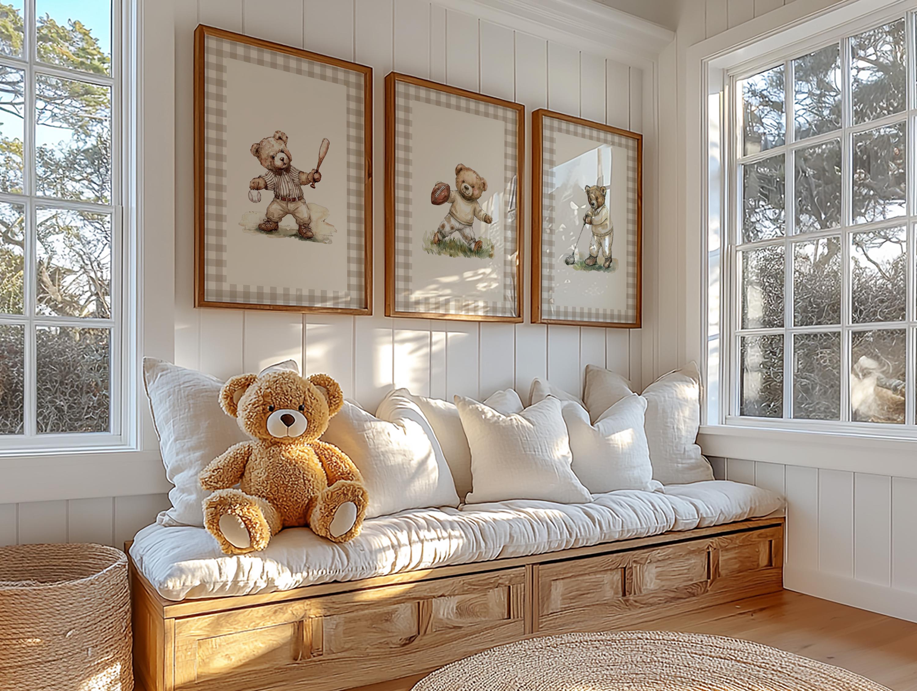 A cozy and inviting room with a plush white sofa, a teddy bear, and three framed pictures of teddy bears on the wall.