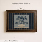 a framed embroidered piece of art with the text "THANK HEAVEN FOR LITTLE BOYS" on it.