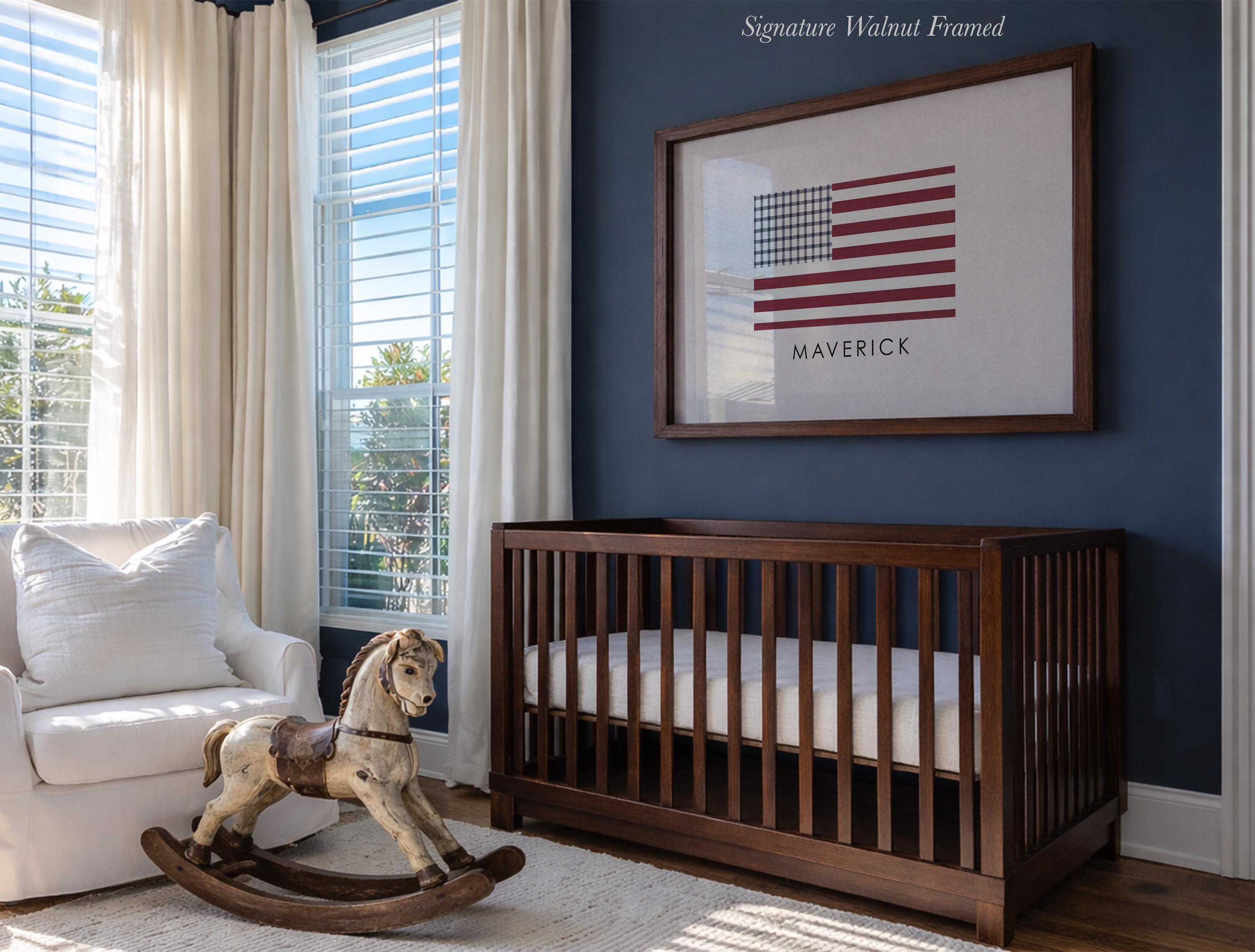 a nursery with a wooden rocking horse, a crib, and a framed American flag on the wall.