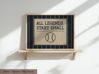 a framed poster with the text "ALL LEGENDS START SMALL" and a baseball graphic.