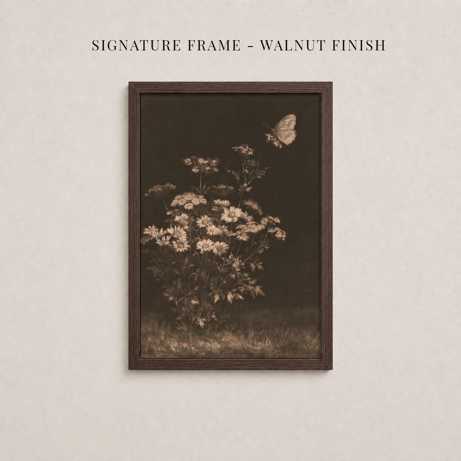 The image is a framed photograph of a flower arrangement with a butterfly in flight.