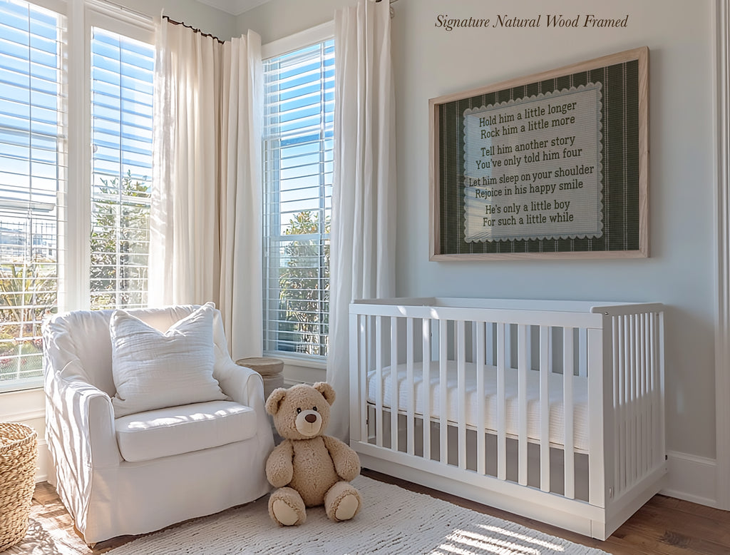 A cozy nursery with a white crib, a white armchair, and a teddy bear, all bathed in soft light from the large windows. A framed nursery rhyme is displayed on the wall above the crib, adding a touch of whimsy to the serene space.