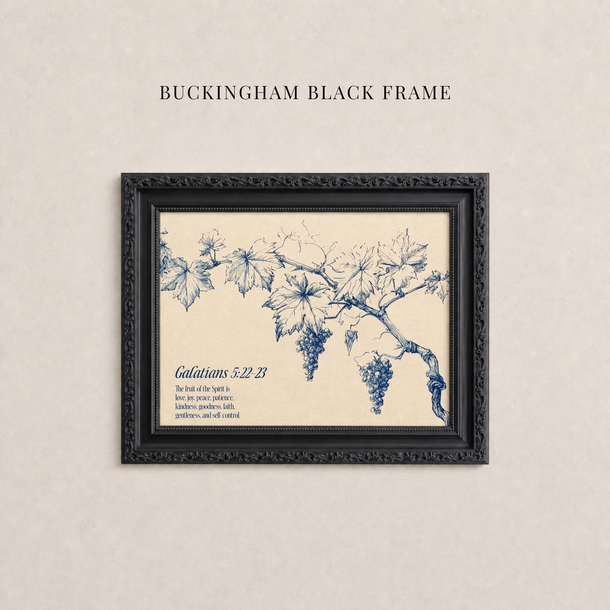 A black framed print with a blue illustration of a branch with grapes hanging from it, accompanied by text.