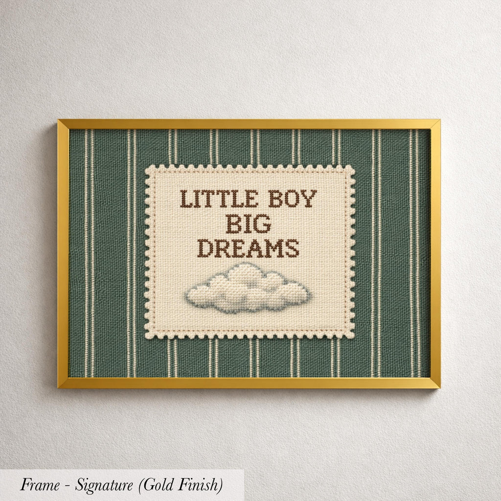 The image is a framed print with a green and white striped background and a cloud-like embroidered design. The text on the print reads "LITTLE BOY BIG DREAMS".