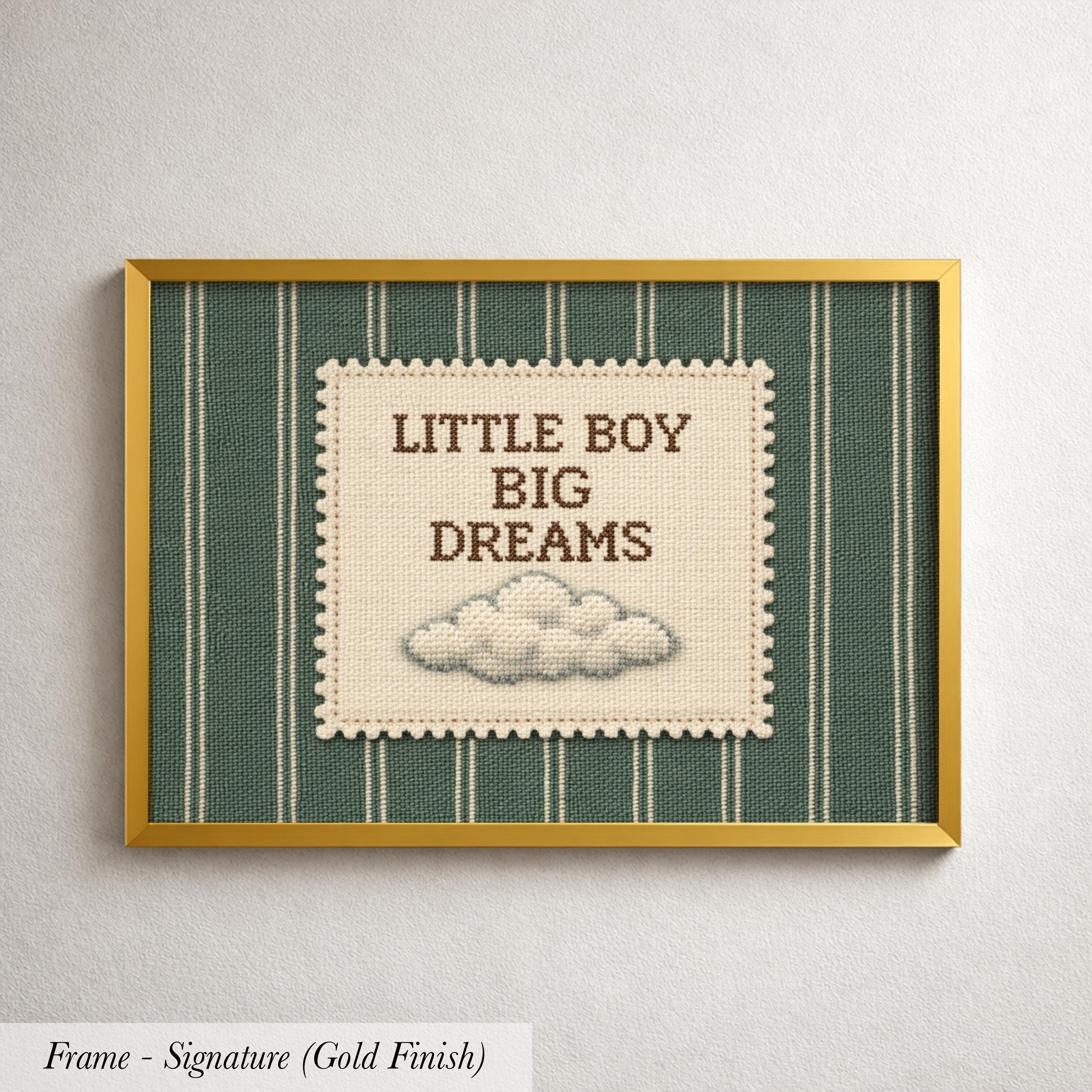 The image is a framed print with a green and white striped background and a cloud-like embroidered design. The text on the print reads "LITTLE BOY BIG DREAMS".