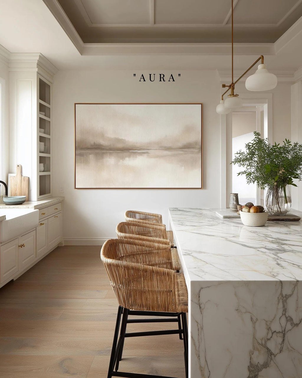 a modern kitchen with a marble countertop, wicker chairs, and a large painting on the wall above the counter.
