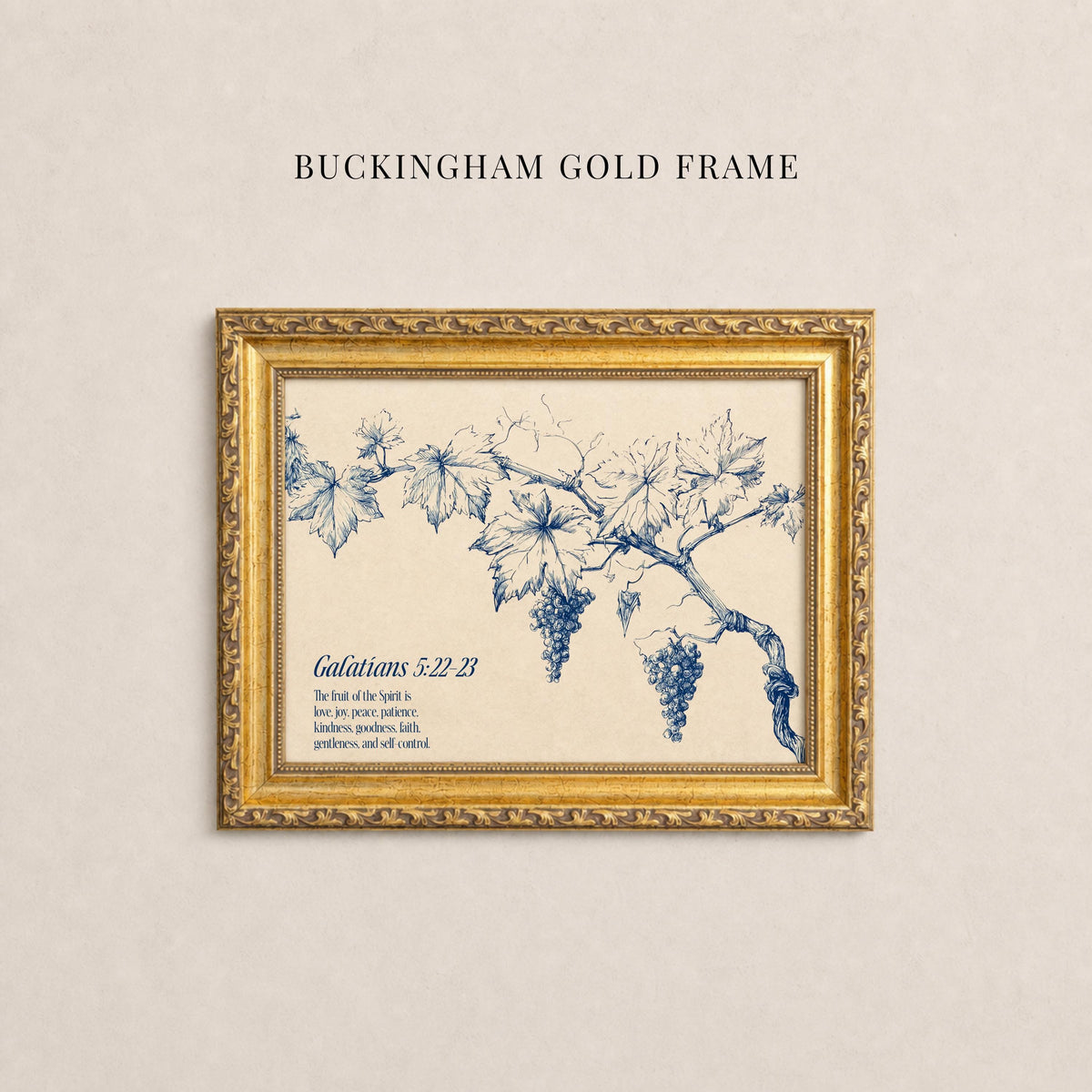 A gold-framed print with a blue illustration of a branch with grapes hanging from it, accompanied by text.