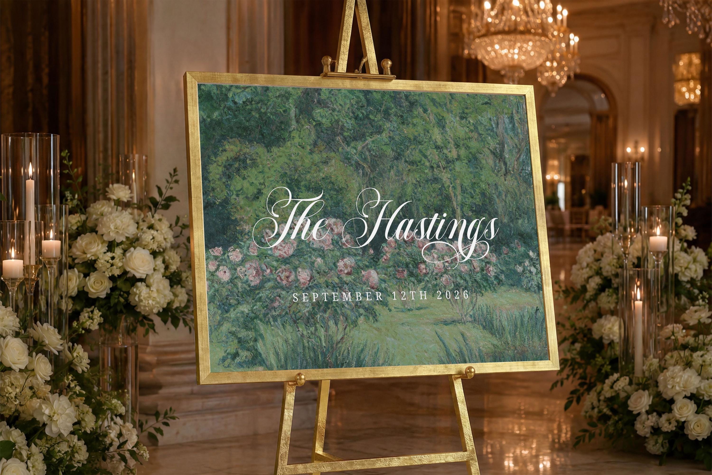 a large sign with a floral design and the text "The Hastings" and "SEPTEMBER 12TH 2026" displayed on it, placed in a room with floral arrangements and candles.