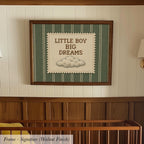 A framed wall hanging with the text "LITTLE BOY BIG DREAMS" and a cloud illustration.