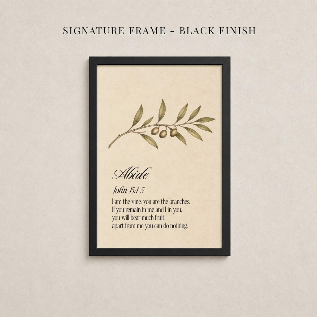 The image is a framed print with a black border and a beige background. The print features a branch with leaves and two small objects, possibly flowers or fruits. The text below the print provides a biblical verse from the book of John, which reads: "Abide. John 3:1-5. If you are the vine you are the branches. If you remain in me and I be in you, you will be much fruit apart from you can do nothing."
