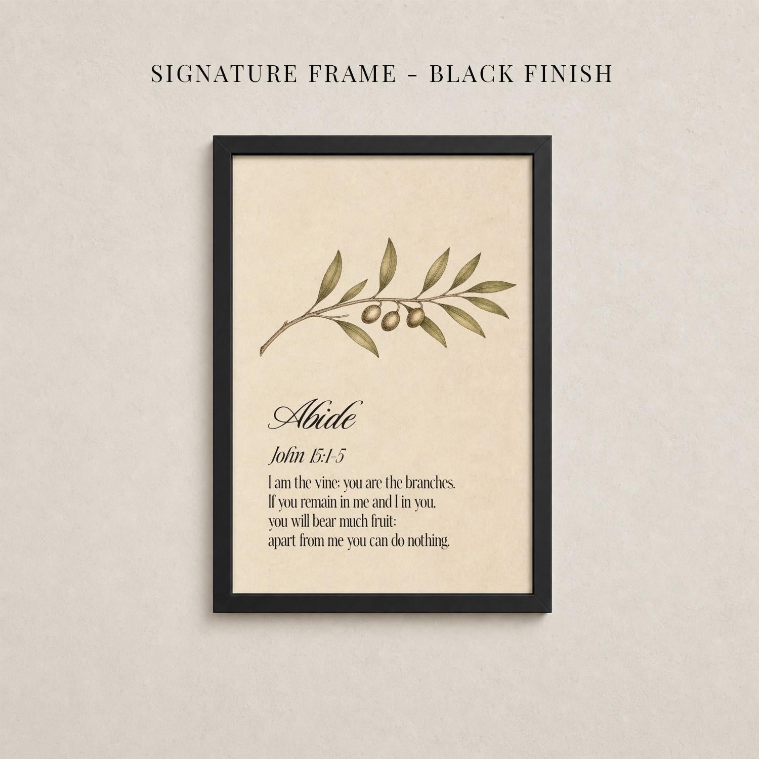 The image is a framed print with a black border and a beige background. The print features a branch with leaves and two small objects, possibly flowers or fruits. The text below the print provides a biblical verse from the book of John, which reads: "Abide. John 3:1-5. If you are the vine you are the branches. If you remain in me and I be in you, you will be much fruit apart from you can do nothing."