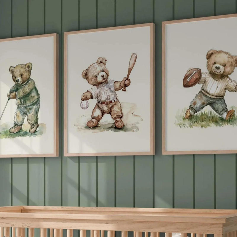three framed pictures of teddy bears, each depicting a different sport: golf, baseball, and football.