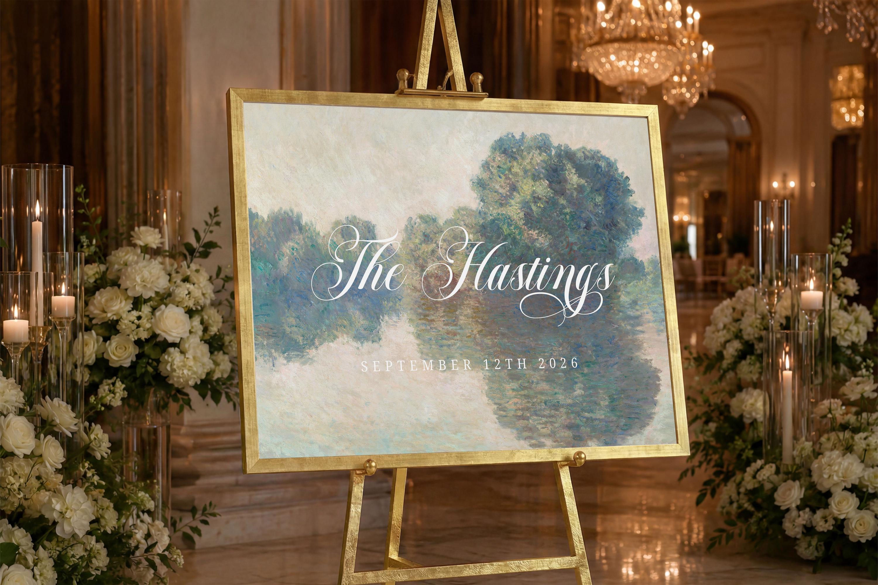 a large sign with the text "The Hastings" and "SEPTEMBER 12TH, 2026" displayed on it, placed in a room with floral arrangements and candles.