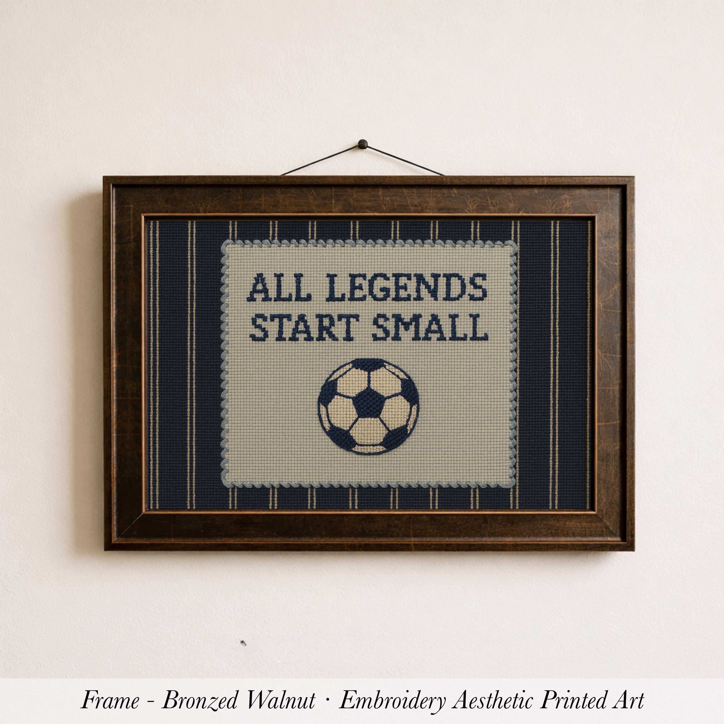 The image is a framed embroidery depicting a soccer ball with the text "ALL LEGENDS START SMALL" on it.