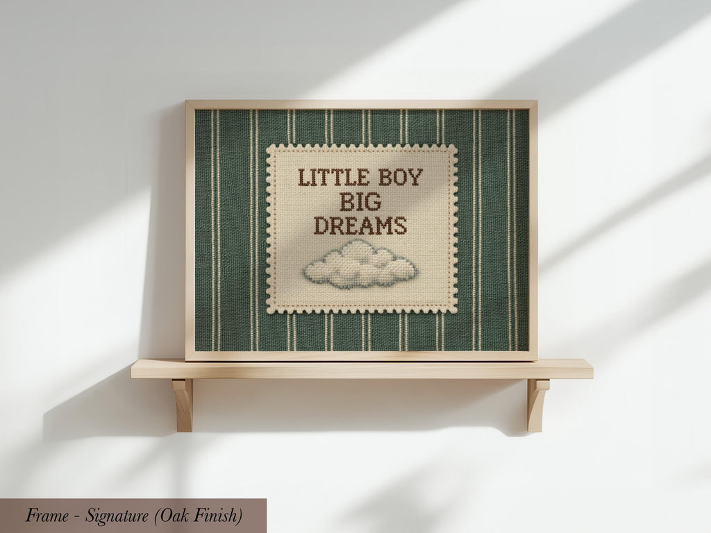 a framed picture with a green and white striped background and a cloud-like design. The text on the picture reads "LITTLE BOY BIG DREAMS".