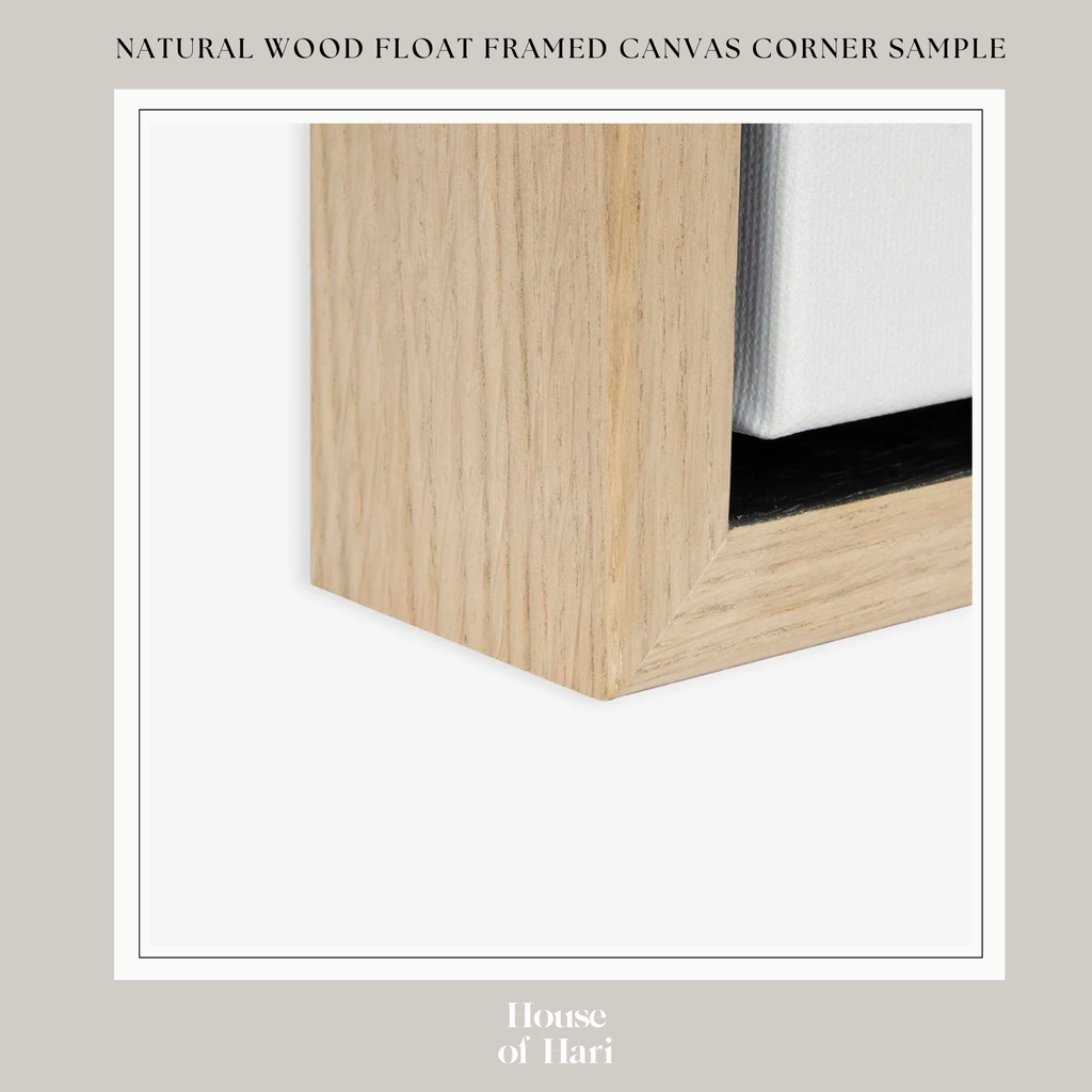 The image is a close-up of a wooden frame with a white canvas inside, showcasing the natural wood grain texture and the frame's design.