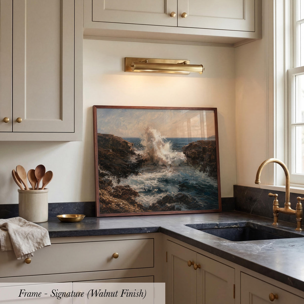 a framed painting of a crashing wave in a kitchen setting.