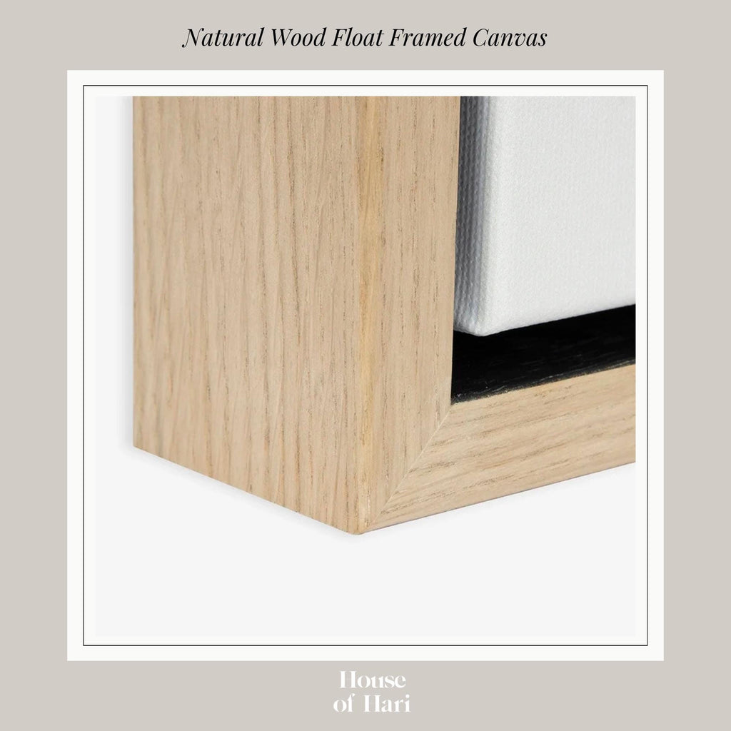 a close-up view of a wooden frame with a white canvas inside it, set against a neutral background.