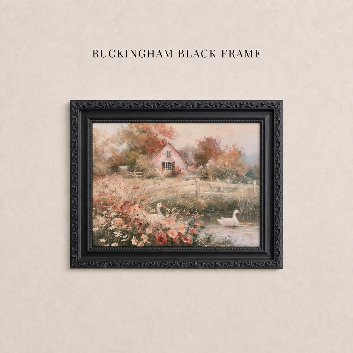 A framed painting of a serene landscape with a pink house, trees, and a pond with swans.