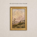 The image is a painting of a rural landscape, featuring a house and trees in the background, framed in a gold frame.