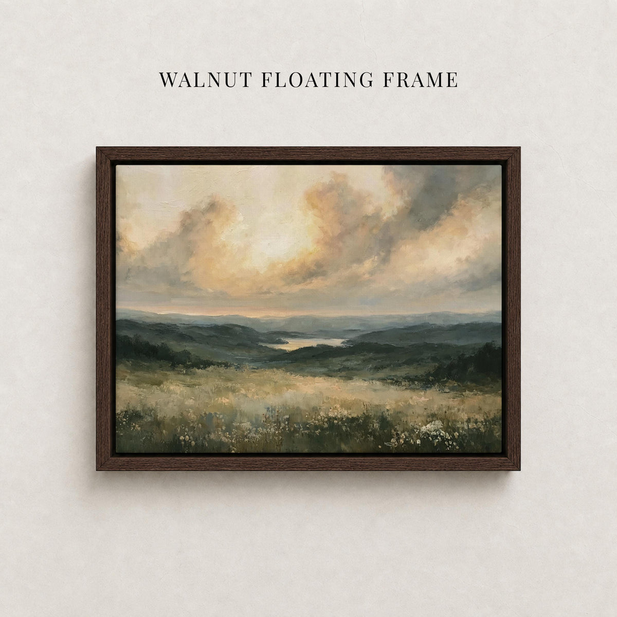 The image is a framed painting depicting a serene landscape with rolling hills, a lake, and a cloudy sky.