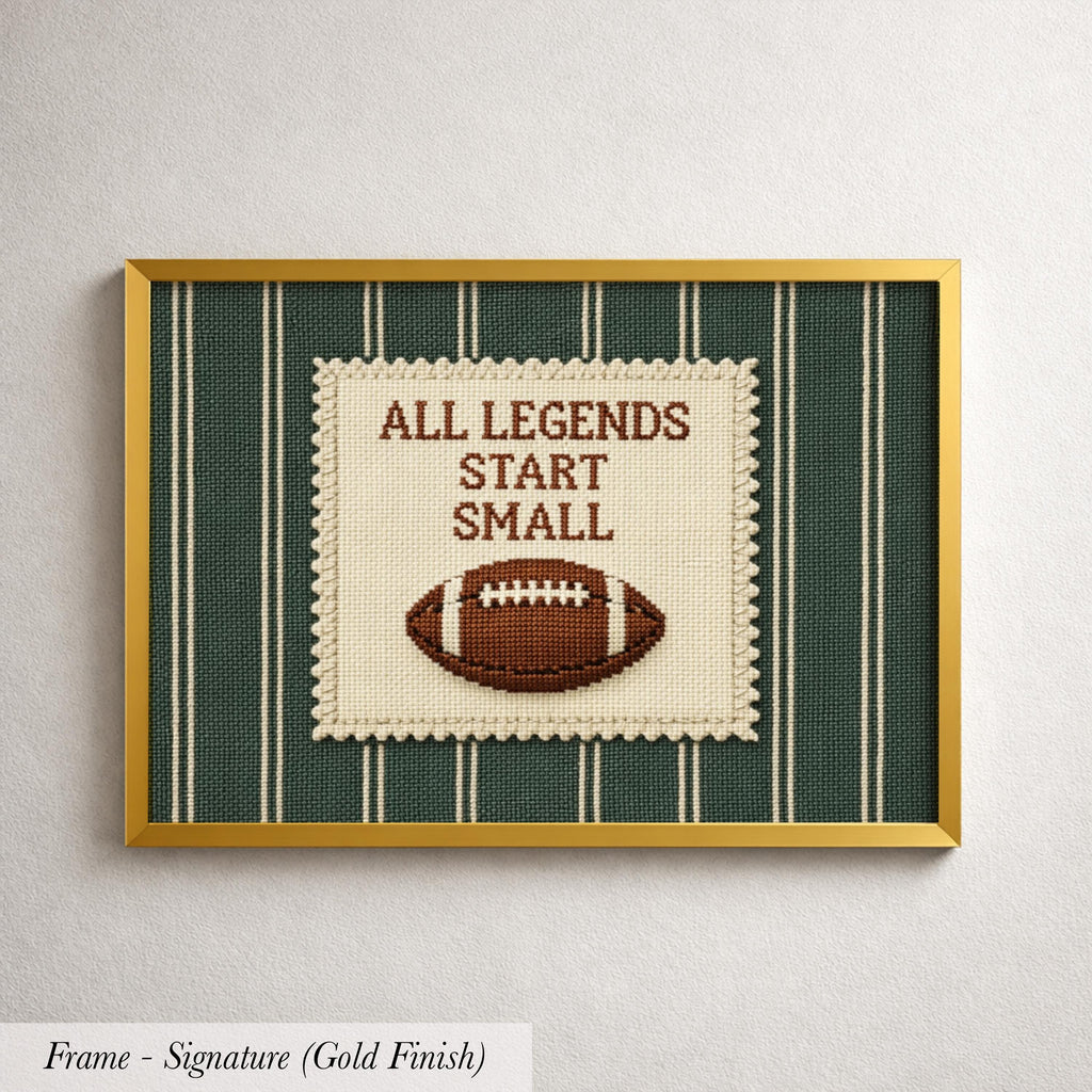 a framed embroidered piece with the text "ALL LEGENDS START SMALL" and a football embroidered on it.