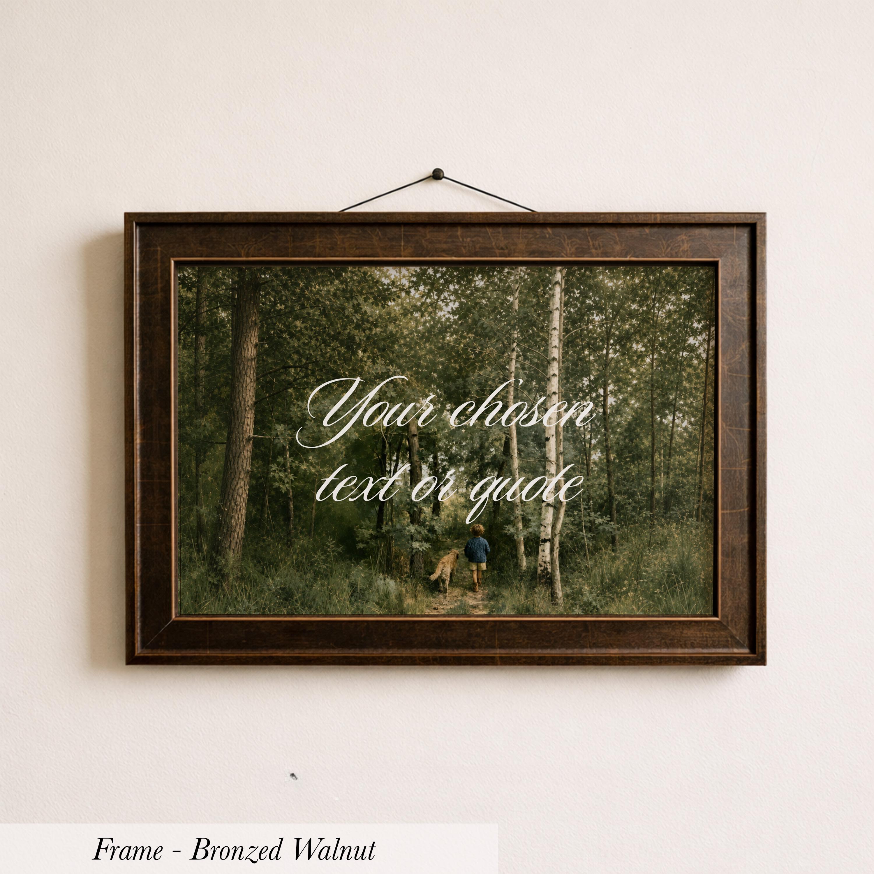 A framed photograph of a forest scene with a person walking through it.