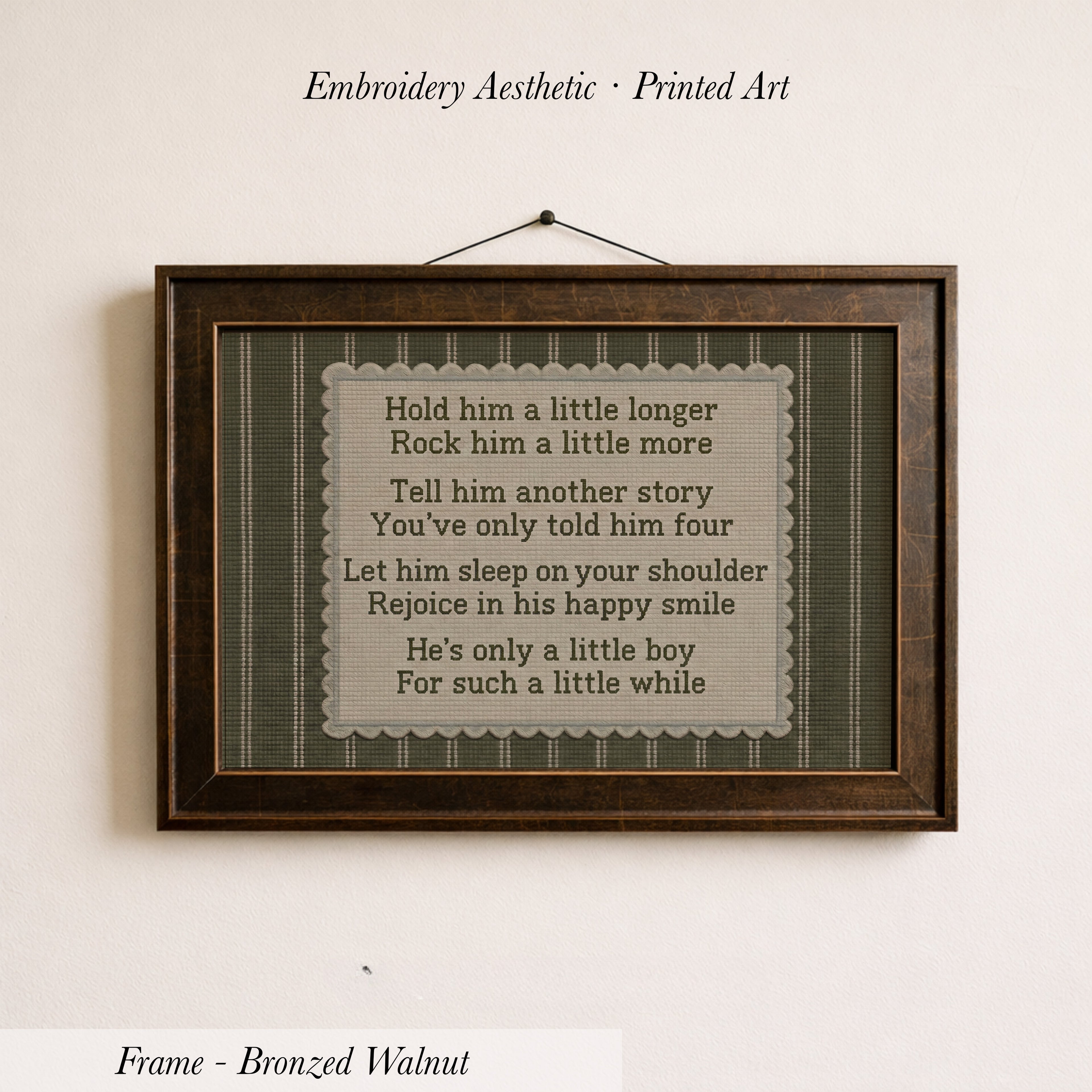 a framed print with a poem or lyrics, hanging on a wall.