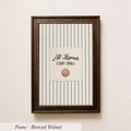 A framed picture with a striped background and a basketball graphic, along with the text "All Legends Start Small" printed on it.