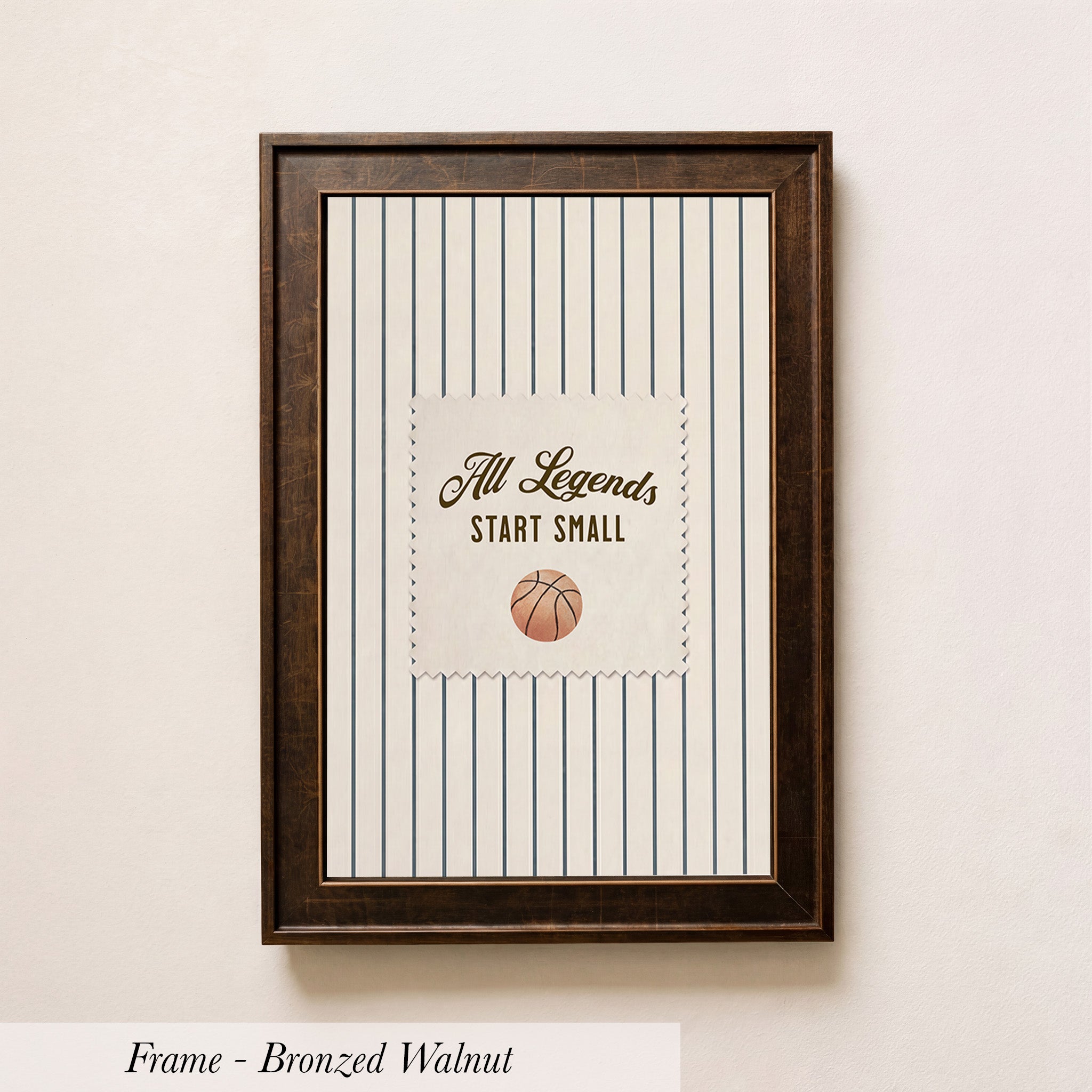 A framed picture with a striped background and a basketball graphic, along with the text "All Legends Start Small" printed on it.