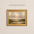 May include: A landscape painting in a decorative gold frame with the text BUCKINGHAM GOLD FRAME above it. The artwork depicts a grassy valley under a cloudy sky with light rays breaking through. The frame features an ornate, textured border.